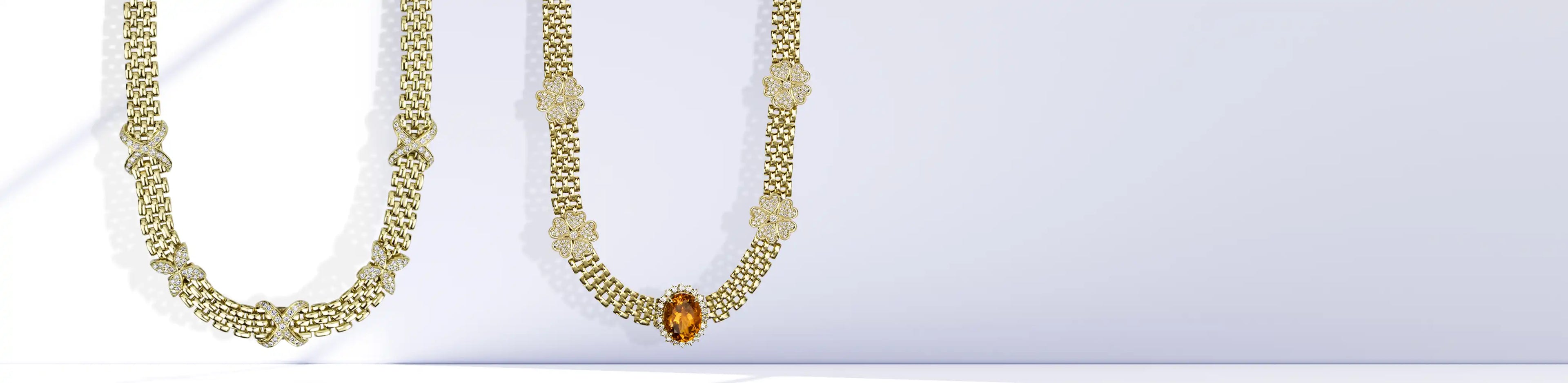 Two gold necklaces with brick link designs, featuring diamond floral accents and one necklace with an oval citrine gemstone centerpiece | Singhvi Jewels Necklaces Collection